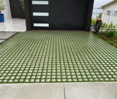 alt="Custom turf driveway for beautiful modern home"/>